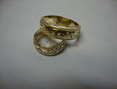Обручальные кольца из желтого золота с узорами