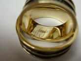 Обручальные кольца из желтого золота с черным родием