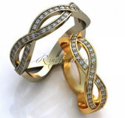 Обручальные кольца Бесконечность оформленные большим количеством бриллиантов