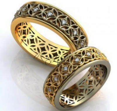 Стильно украшенное узором и камнями кельтское обручальное кольцо