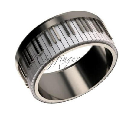 Широкое кольцо для свадьбы в виде клавиш пианино