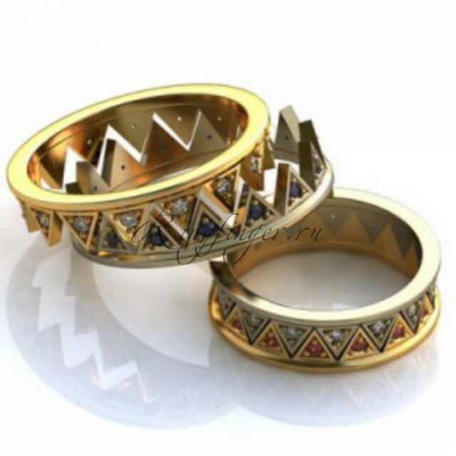 Двойные обручальные кольца в виде короны и украшением каждого зубца драгоценным камнем