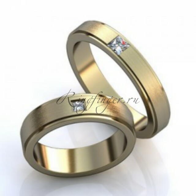 Матовые свадебные кольца с одним бриллиантом и без дополнительных украшений