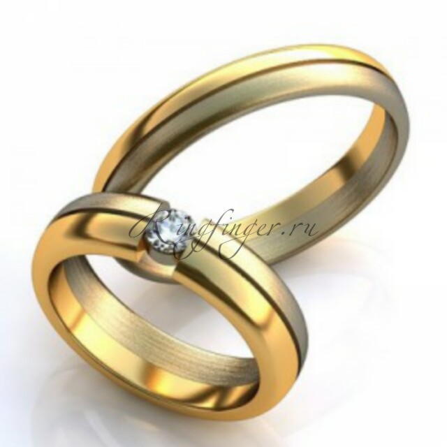 Классические парные кольца для венчания из двух видов золота и с камнем
