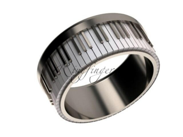 Широкое кольцо для свадьбы в виде клавиш пианино